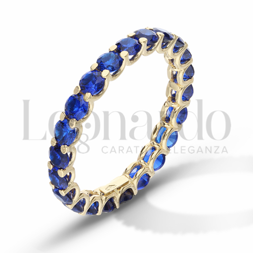 Modello o finitura Veretta a griffe con Zircone Blu in Oro Giallo da 2,5gr.