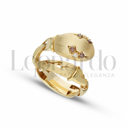 con Zirconi bianchi e zirconi Brown in Oro Giallo da 5,1gr.