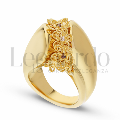 con Zirconi bianchi e zirconi Brown in Oro Giallo da 5,7gr.
