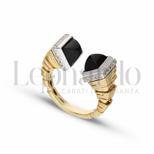 con Pietra nera e zirconi bianchi in Oro Giallo e Oro Bianco da 7gr.