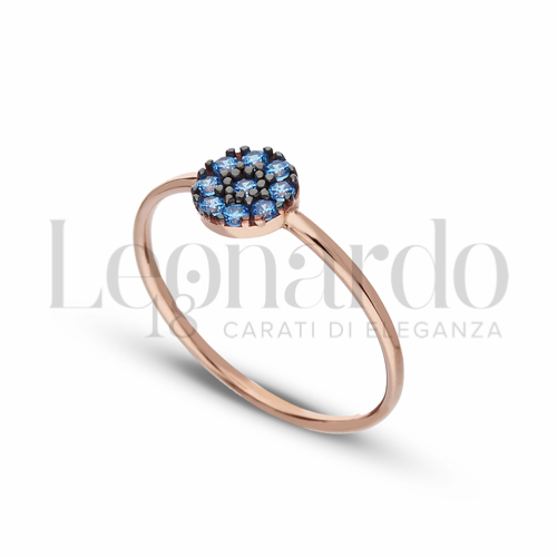 Modello 1 ° Misura con Zircone Blu in Oro Rosa da 1,2gr.
