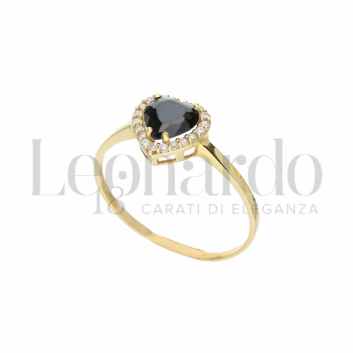 Contornato da una fila di zirconi Modello con Pietra nera e zirconi bianchi in Oro Giallo da 1,5gr.