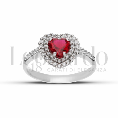 Contornato da due file di zirconi Modello con Pietra di Colore Rosso e zirconi bianchi in Oro Bianco da 3,3gr.