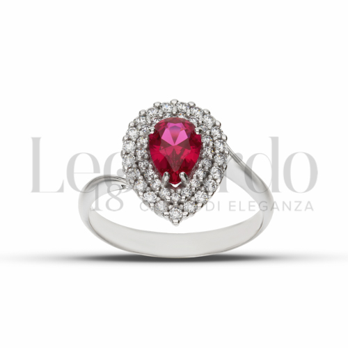 Contornato da due file di zirconi Modello con Pietra di Colore Rosso e zirconi bianchi in Oro Bianco da 3,5gr.