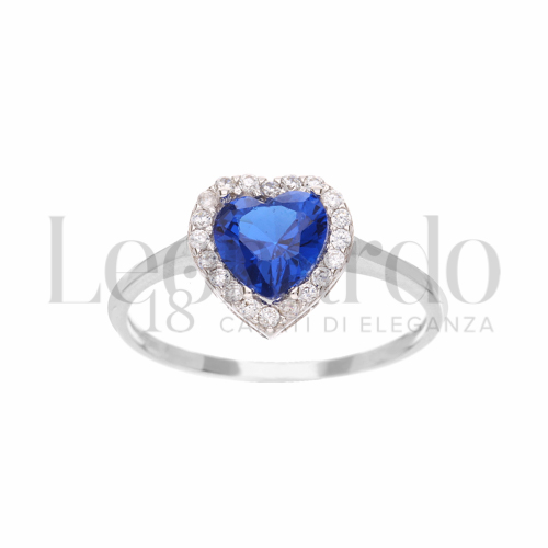 Contornato da una fila di zirconi Modello con Pietra di Colore Blu e zirconi bianchi in Oro Bianco da 1,4gr.