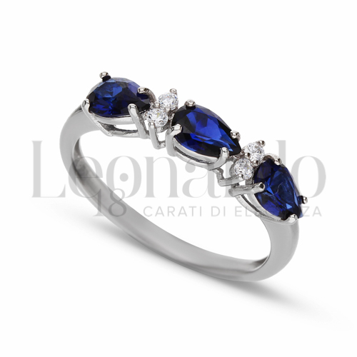 Trilogy Orizzontale Modello con Pietra di Colore Blu e zirconi bianchi in Oro Bianco da 2,6gr.