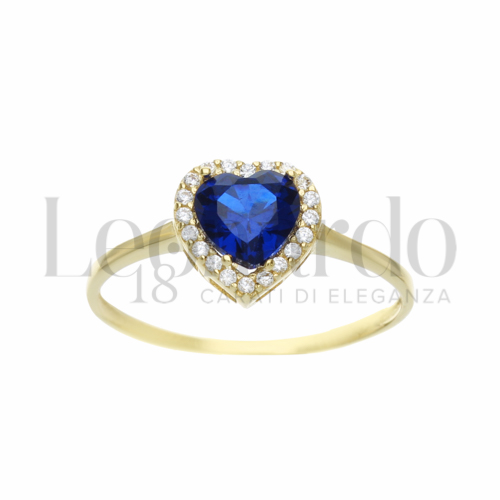 Contornato da una fila di zirconi Modello con Pietra di Colore Blu e zirconi bianchi in Oro Giallo da 1,4gr.