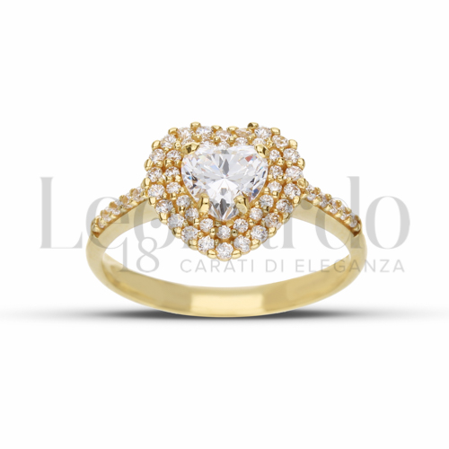 Contornato da due file di zirconi Modello con Pietra Bianca e zirconi bianchi in Oro Giallo da 3,9gr.