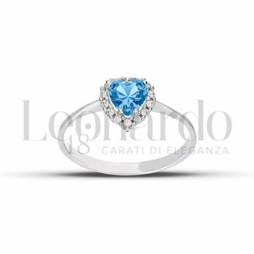 Contornato da una fila di zirconi Modello con Topazio azzurro e zirconi bianchi in Oro Bianco da 1,9gr.
