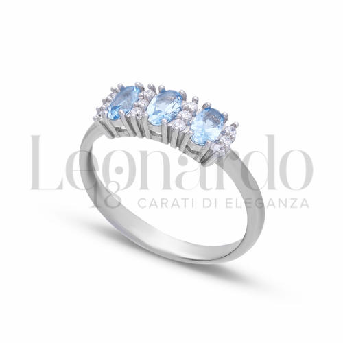 Trilogy Modello con Topazio azzurro e zirconi bianchi in Oro Bianco da 2,5gr.