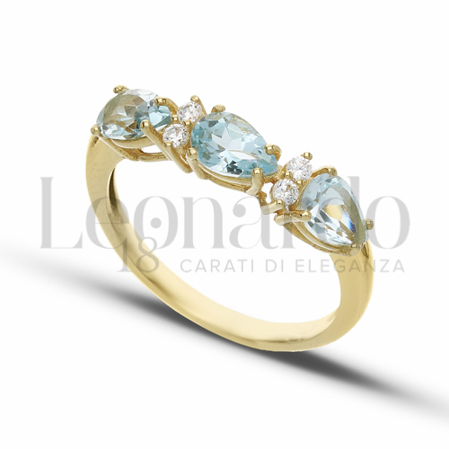 Trilogy Orizzontale Modello con Topazio azzurro e zirconi bianchi in Oro Giallo da 2,5gr.