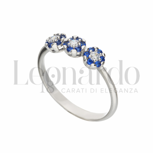 3 Fiori Modello con Zirconi blu e zirconi bianchi in Oro Bianco da 2,1gr.