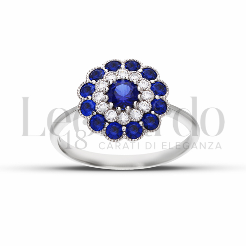 1° Misura Modello con Zirconi blu e zirconi bianchi in Oro Bianco da 2,5gr.