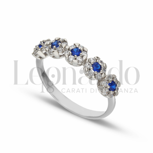 5 Fiori Modello con Cuore di zirconi blu e contorno di zirconi bianchi in Oro Bianco da 2,3gr.