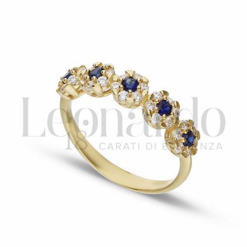 5 Fiori Modello con Cuore di zirconi blu e contorno di zirconi bianchi in Oro Giallo da 2,5gr.