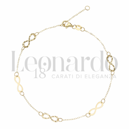 Modello Elementi distanti lucidi e diamantati in Oro Giallo da 1,2gr.