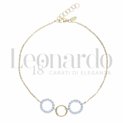 Modello Elementi in linea con Zircone bianco in Oro Giallo e Oro Bianco da 2,1gr.