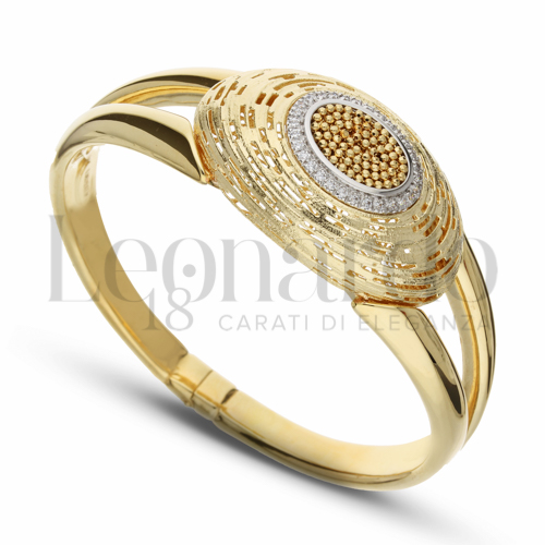 Modello o spessore Ovale con Zircone bianco in Oro Giallo e Oro Bianco da 19,3gr.
