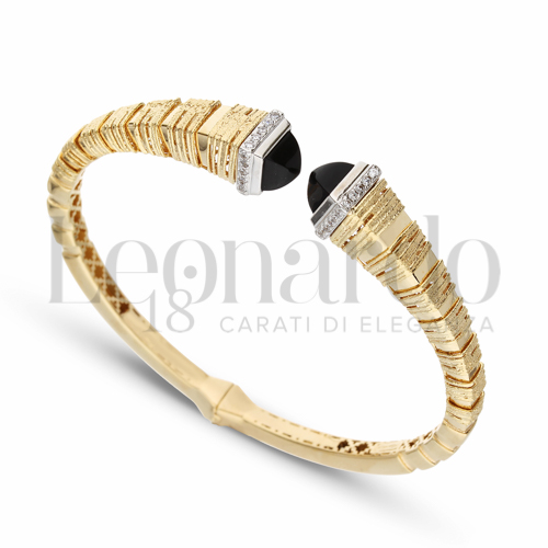 con Pietra nera e zirconi bianchi in Oro Giallo e Oro Bianco da 17gr.
