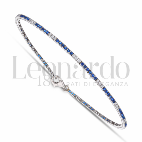 con 6+3 6 Zirconi blu + 3 Zirconi bianchi da Misura pietra 1,10 mm in Oro Bianco da 3,7gr.