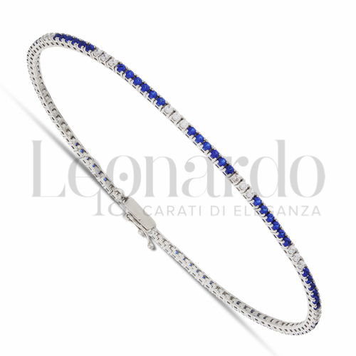 con 6+3 6 Zirconi blu + 3 Zirconi bianchi da Misura pietra 1,50 mm in Oro Bianco da 5,7gr.