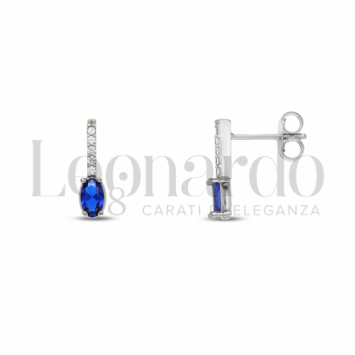 Forma Ovale con Pietra di Colore Blu e zirconi bianchi in Oro Bianco da 1,5gr.