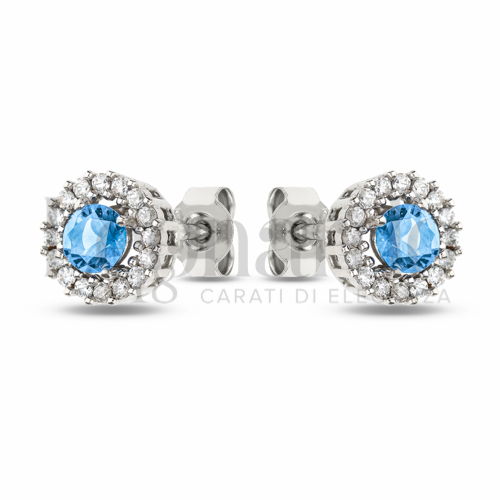 Forma Tondo con Topazio azzurro e zirconi bianchi in Oro Bianco da 2,3gr.