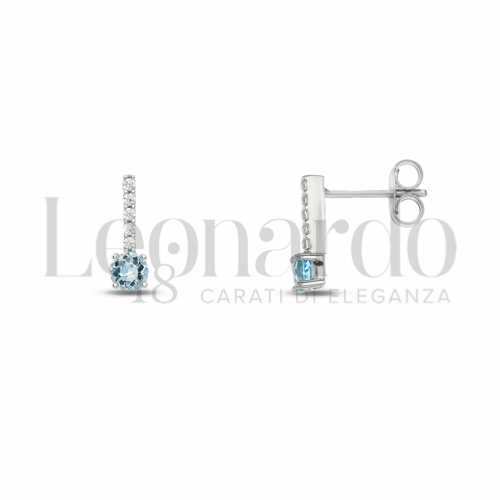 Forma Tondo con Topazio azzurro e zirconi bianchi in Oro Bianco da 1,3gr.