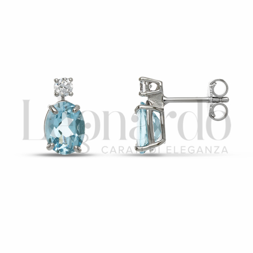 Forma Ovale con Topazio azzurro e zirconi bianchi in Oro Bianco da 2,5gr.