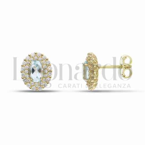 Forma Ovale con Topazio azzurro e zirconi bianchi in Oro Giallo da 3gr.
