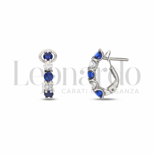Forma Tondo con Zirconi blu e zirconi bianchi in Oro Bianco da 2,1gr.