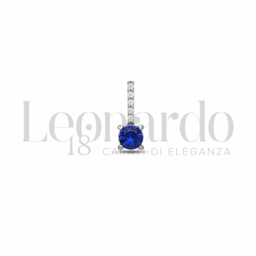 Forma Tondo con Pietra di Colore Blu e zirconi bianchi in Oro Bianco da 0,5gr.