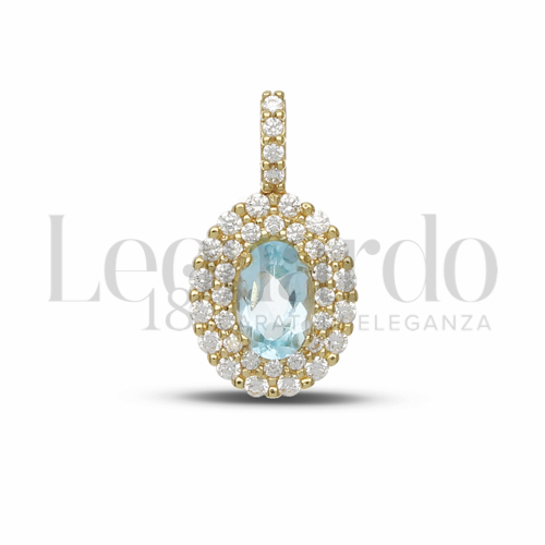 Forma Ovale con Topazio azzurro e zirconi bianchi in Oro Giallo da 1,3gr.