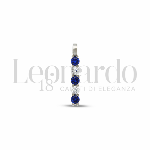 Forma Tondo con Zirconi blu e zirconi bianchi in Oro Bianco da 0,7gr.