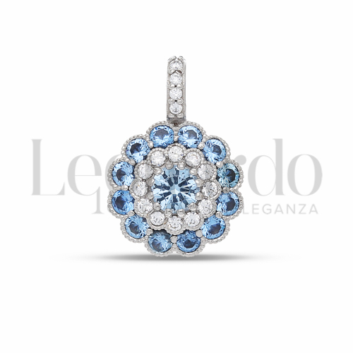 Forma Fiore con Zirconi azzurri e zirconi bianchi in Oro Bianco da 1,4gr.